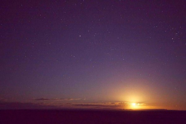 moonrise over the sahara desert morocco