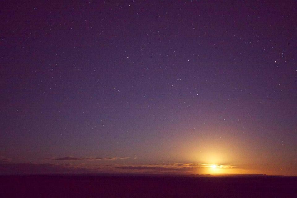 moonrise over the sahara desert morocco